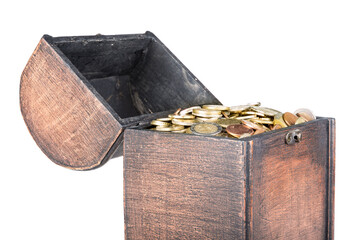 Wooden money chest filled with coins isolated at a white background