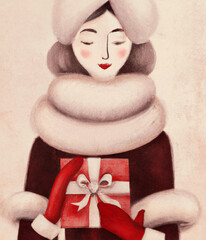 Woman holding Christmas present