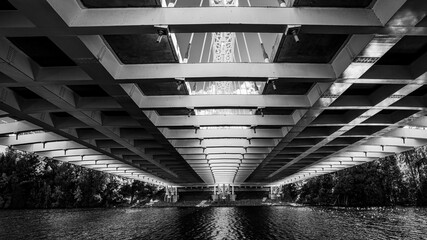 Underneath the Vimy Memorial Bridge on the Rideau River in Ottawa, Ontario, Canada - obrazy, fototapety, plakaty