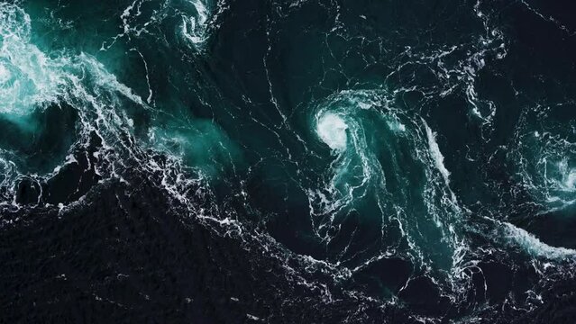 Footage of abstract water currents, rapids and whirlpools in fjord. Saltstraumen Norway