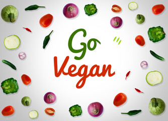 Go vegan background with fresh vegetables and typography in the center. Vegetable food concept design