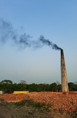 The photo represents the pollution in Bangladesh in the brick-making mill. Climate is changing in Bangladesh and all over the world.