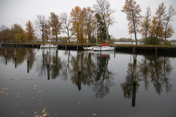 Sweden. Vadstena. Boat dock on a cloudy foggy day