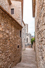 Beautiful streets of Girona old town with ancient buildings and cobblestone stairways, Spain
