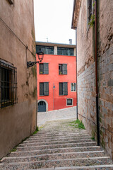 Fototapeta na wymiar Beautiful streets of Girona old town with ancient buildings and cobblestone stairways, Spain