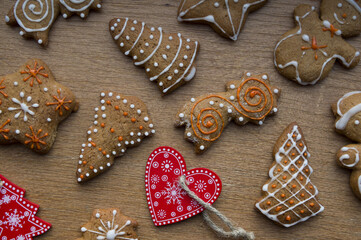 Set of different homemade Christmas cookies isolated on background, close up view with copy space for text. New year frame with tasty gingerbread cookies with spices. Winter holiday concept