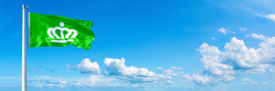 Charlotte - USA, flag waving on a blue sky in beautiful clouds - Horizontal banner
