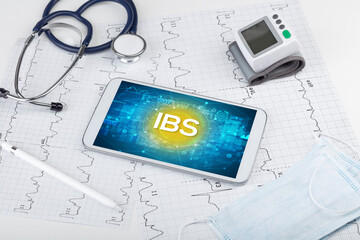 Close-up view of a tablet pc with medical abbreviation