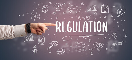 Close-Up of cropped hand pointing at business inscription