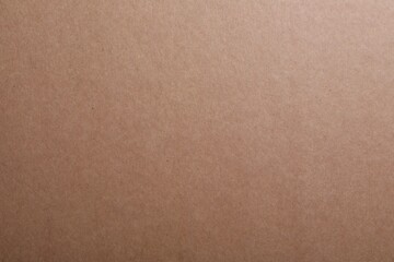 Texture of kraft paper bag as background, closeup