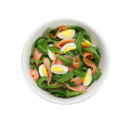 Delicious salad with boiled eggs, salmon and arugula in bowl isolated on white, top view