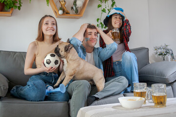 friends watching soccer in frustration and despair