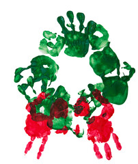 Isolated child's handprint paint wreath in red and green