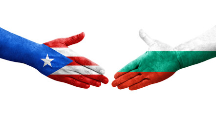 Handshake between Bulgaria and Puerto Rico flags painted on hands, isolated transparent image.