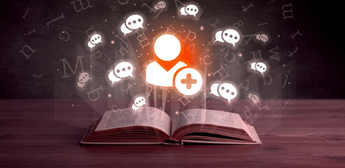 Open book with social networking icons above