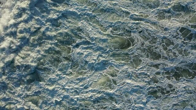 Dramatic Sea Texture 4K filmed on a drone in the sunset