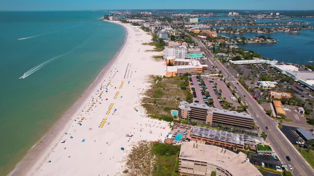 Florida. Summer vacations. St. Pete Beach Florida US. Ocean beach, hotels and resorts. Turquoise color of salt water. American Coast or shore line. Gulf of Mexico. St Petersburg Florida. Tampa bay.