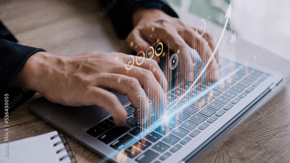 Poster people using tablets and using his finger to touch the screen with a business graph showing up in a 