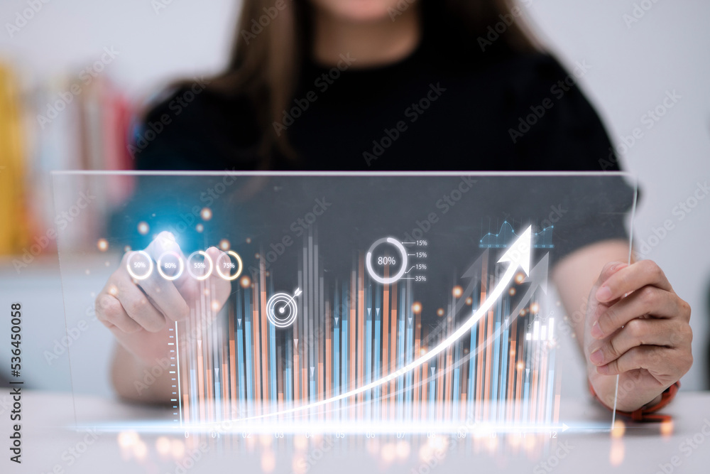 Poster people using tablets and using his finger to touch the screen with a business graph showing up in a 