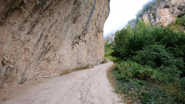 pedestrian path along the Molinar river next to Tobera village, municipality of Fr&iacute;as, province of Burgos, Castile and Le&oacute;n, Spain