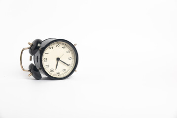 black vintage alarm clock isolated on white background, Time concept, 9:35 o'clock. Morning, reminder.