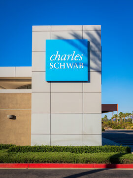 Charles Schwab Sign on Drive-thru Wall