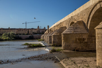 The Roman Bridge of Cordoba is a bridge in the historic center of Cordoba, Andalusia, southern Spain, originally built in the early 1st century BC over the Guadalquivir River,