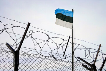 estonian Russian border. Concept of estonia closed borders with flag and wire fence. Ukraine...