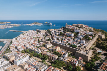 Fototapeta na wymiar Aerial view of Ibiza, Balearic Islands, Spain. Harbor, waterfront and old town.