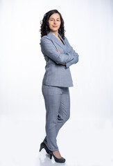 woman with curly black hair in a business suit. isolated, white background