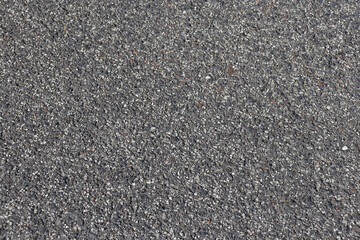 full frame of textured surface of bitumen road