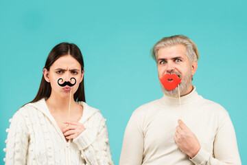 Gender concept. Identity transgender, gender stereotypes. Couple of woman with moustache and man...