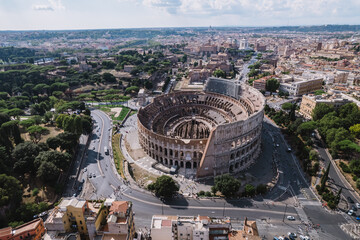 The Colosseum and the Imperial Forums in Rome beautiful aerial shot around the Colosseum.