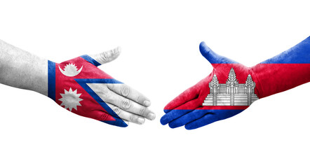 Handshake between Cambodia and Nepal flags painted on hands, isolated transparent image.