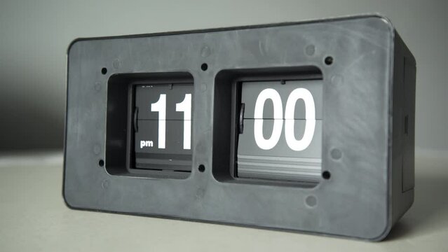 Flip clock show it's 11 p.m. time