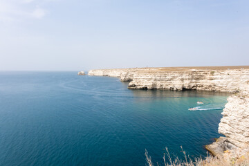 Cape Tarkhankut. Natural landmark of Crimea. Rocks and sea. Rocky coast of Crimea. Tourism, vacation in nature.