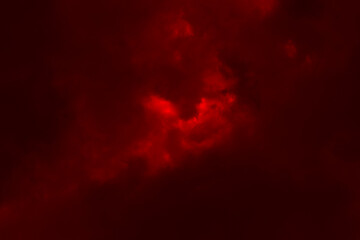 Red night sky background. Blurred photo of dark red sky. Photo can be used for the concept of Halloween and galaxy space background.	
