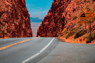 Road in mountains. Country road in USA. Road panorama on sunny summer day.