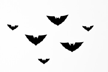 Halloween symbol concept, Silhouette of flying horror black bat isolated on white background