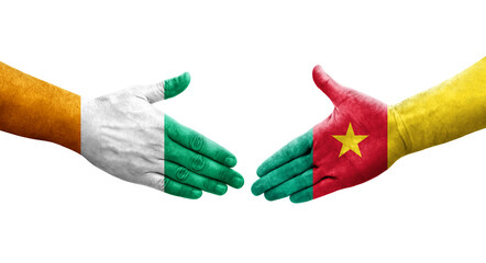 Handshake between Cameroon and Ivory Coast flags painted on hands, isolated transparent image.