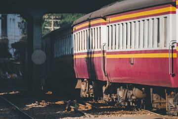 Thai railway train with locomotive runs in Bangkok