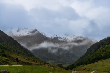 Landscape of snow-capped Pyrenean peaks, in the Ossau valley, in Béarn, France