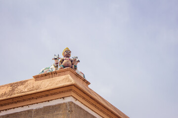Fototapeta na wymiar Ayyanar and bulls at Jambukeswarar Temple complex in Thiruvanaikaval, Tamil Nadu