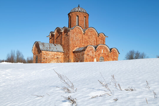 Medieval Church of the Transfiguration of the Savior on Kovalevo in March landscape. Neighborhood of Veliky Novgorod, Russia