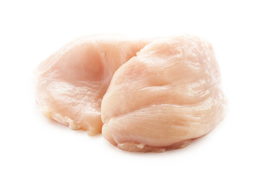 Two Fresh Raw Chicken Skinless Breast Isolated On White Background. Fresh Chicken Breast Skinless Isolated On White Background. Boneless Skinless Split Chicken Breast                