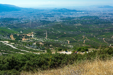 Panoramic view of Athens, as seen from the top of the mountain Penteli near Athens, Greece.