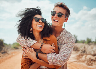 Couple, happy and smile hug in nature on a travel, adventure and road trip outdoor. Happiness of...