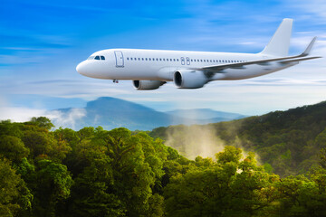 Commercial airplane above in summer season and blue sky over beautiful scenery nature background,concept business travel and transportation summer vacation travel.