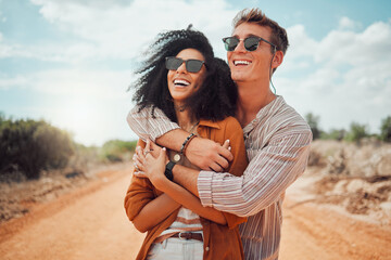 Happy couple, hug and love, smile and travel on roadtrip to the outback of Australia. Adventure,...