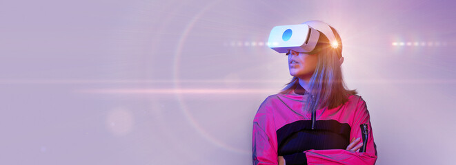 Woman is using virtual reality headset. Concept of virtual, augmented and extended reality and metaverse.